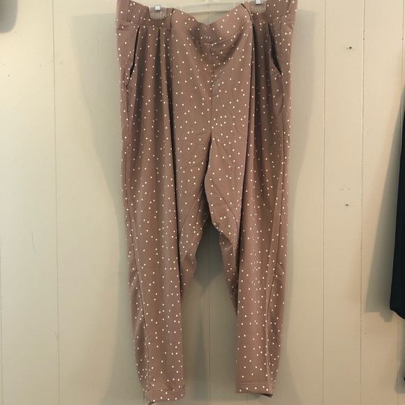 torrid Pants - Mauve polka dotted skinny leg trousers from Torrid size 4